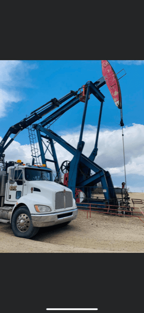 Carrying Out Repairs on Unit - - Prairie Gold Pumpjack Services